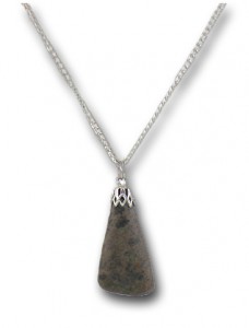 Uranium Ore (Carnotite) Pendant. Strength is 4 uSv/hour