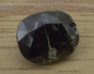 Thorite crystal before mounting in ring. 65 uSv/hour strength.
